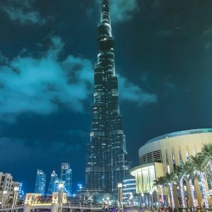 Stunning night view of Burj Khalifa, the tallest skyscraper in Dubai, illuminated against the sky.