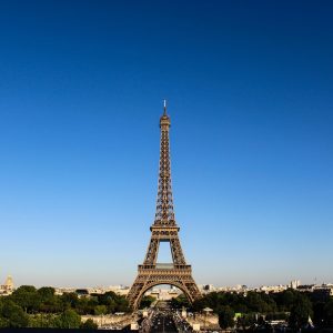 Stunning daylight shot capturing the Eiffel Tower with clear blue skies in Paris.